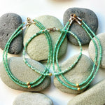 One of a Kind Emeralds with 18K Gold Bracelets
