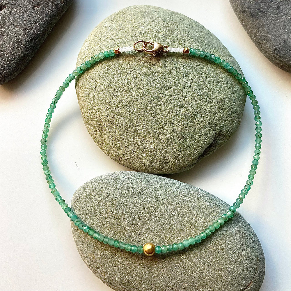One of a Kind Emeralds with 18K Gold Bracelets