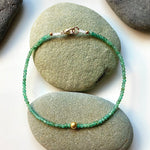 One of a Kind Emeralds with 18K Gold Bracelets