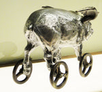 Cast Bronze and Aluminum Flying Piggy Bank on Wheels